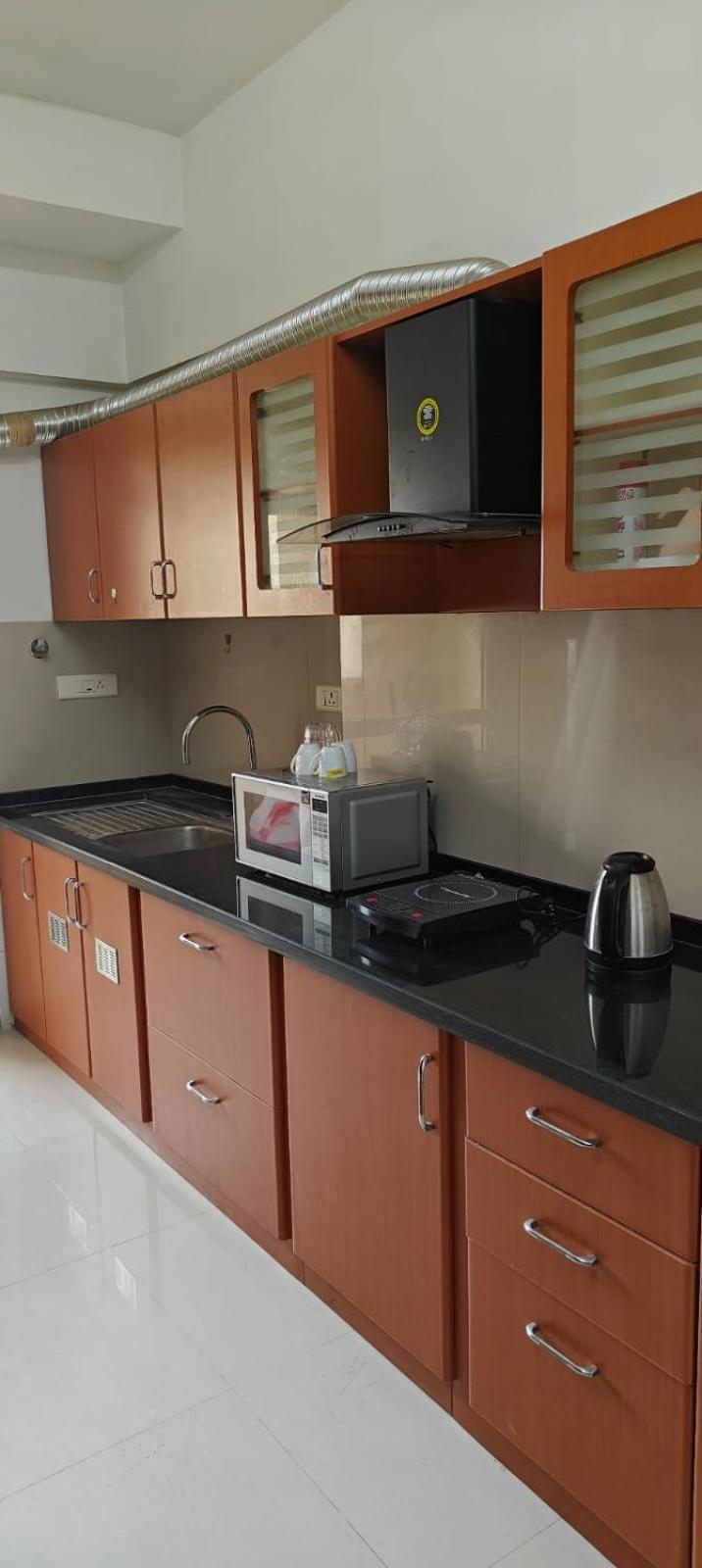 Rockfort Stay Inn Oragadam Bagian luar foto
