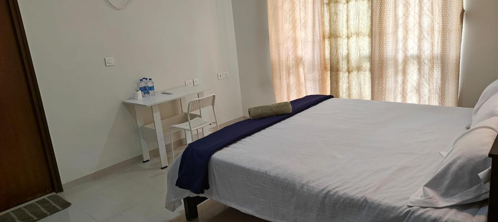 Rockfort Stay Inn Oragadam Bagian luar foto