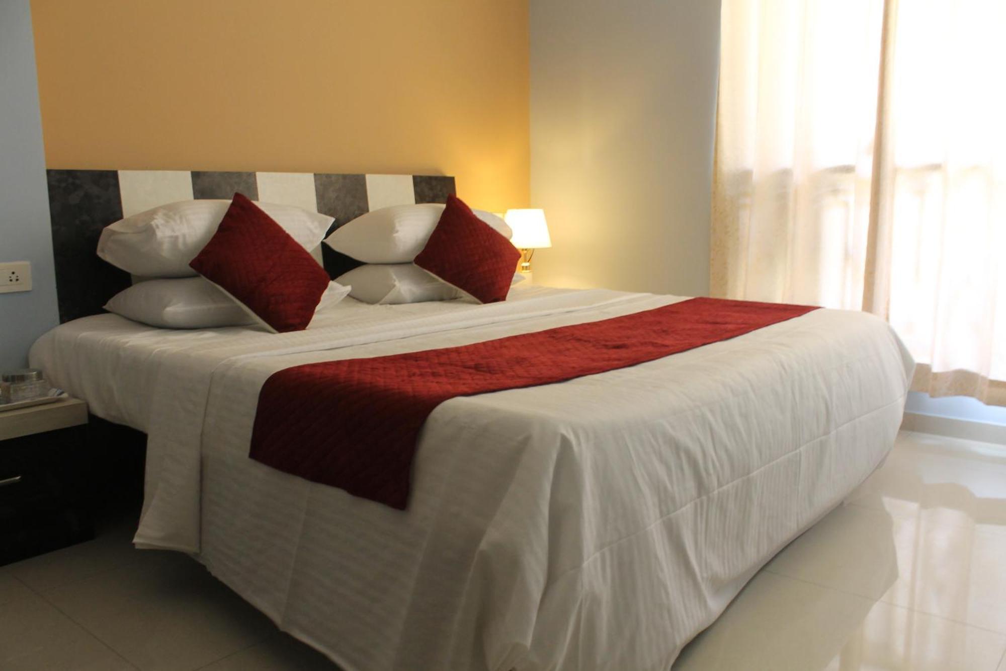 Rockfort Stay Inn Oragadam Bagian luar foto