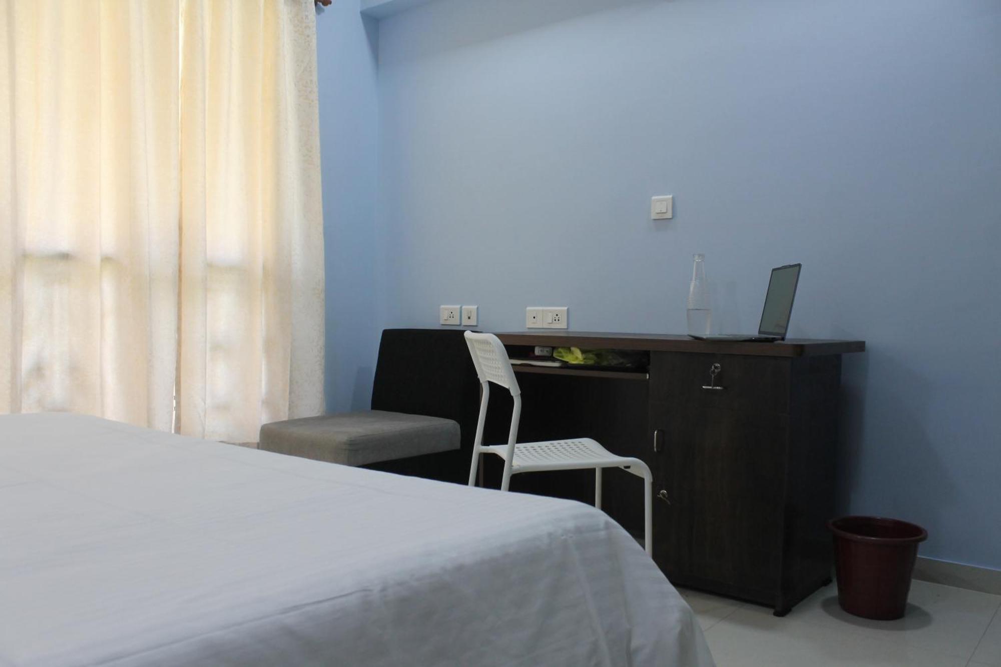 Rockfort Stay Inn Oragadam Bagian luar foto