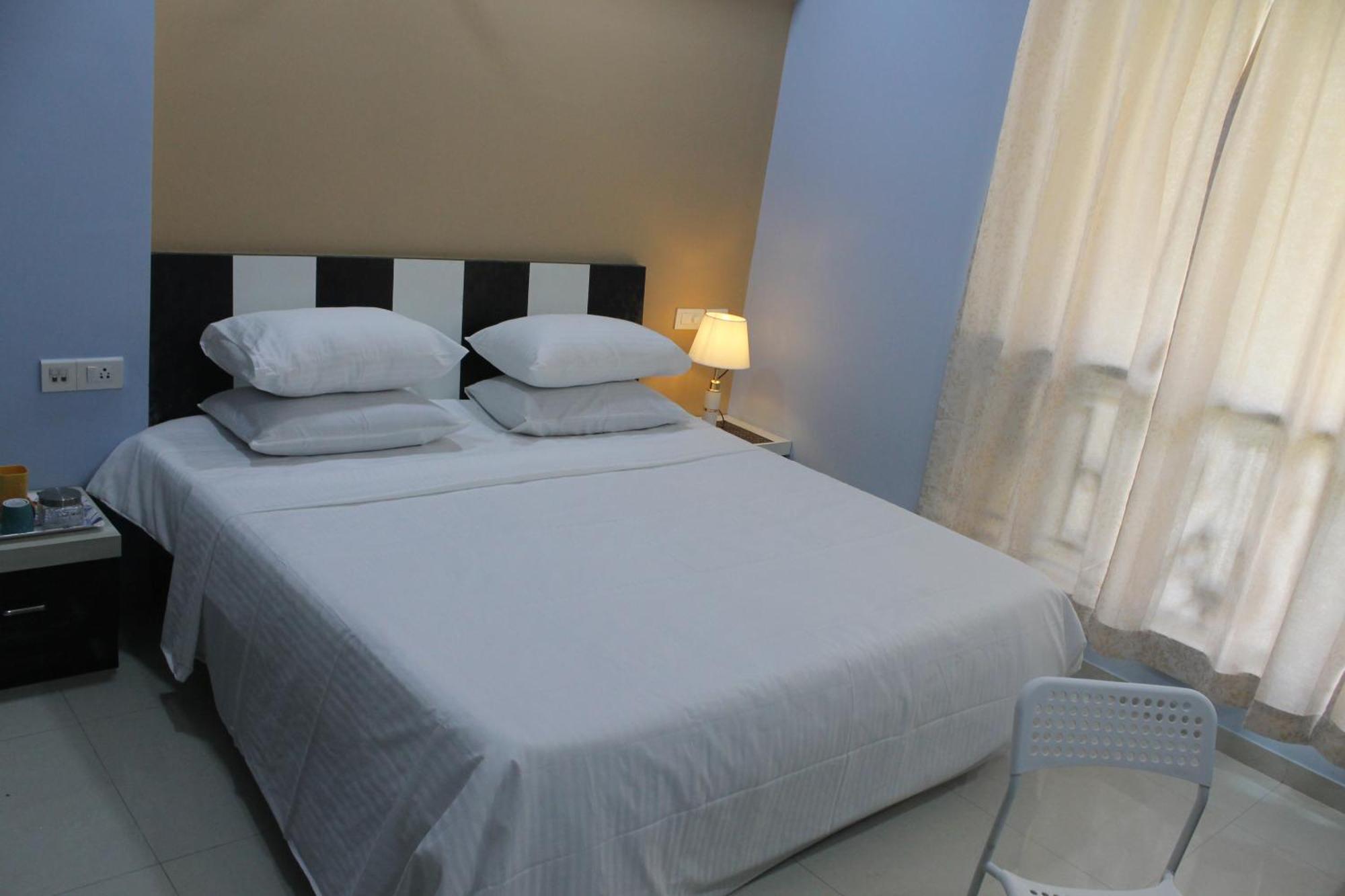 Rockfort Stay Inn Oragadam Bagian luar foto